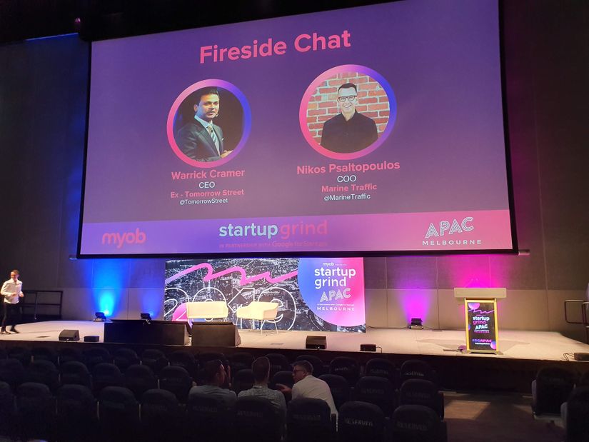 Startup Grind Stage with Warrick and Nikos profile on screen